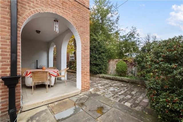 view of patio with outdoor dining area