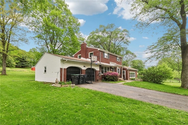 295 Bradford Rd, Marshall, PA 15090 - view of front of property featuring brick siding, a garage, a front lawn, and a chimney