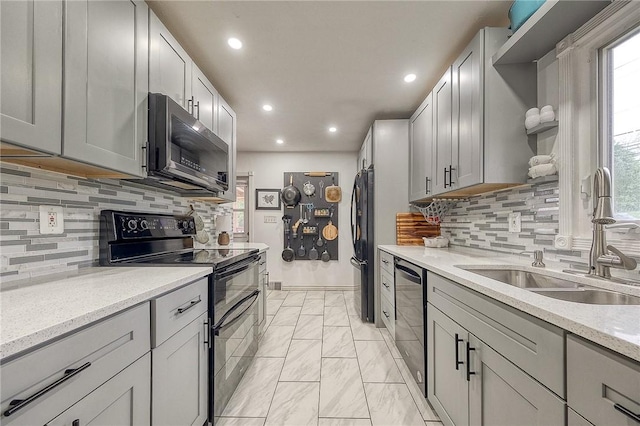 1814 Roosevelt Rd, Ohio Twp, PA 15143 - kitchen featuring black appliances, a sink, open shelves, light marble finish flooring, and recessed lighting