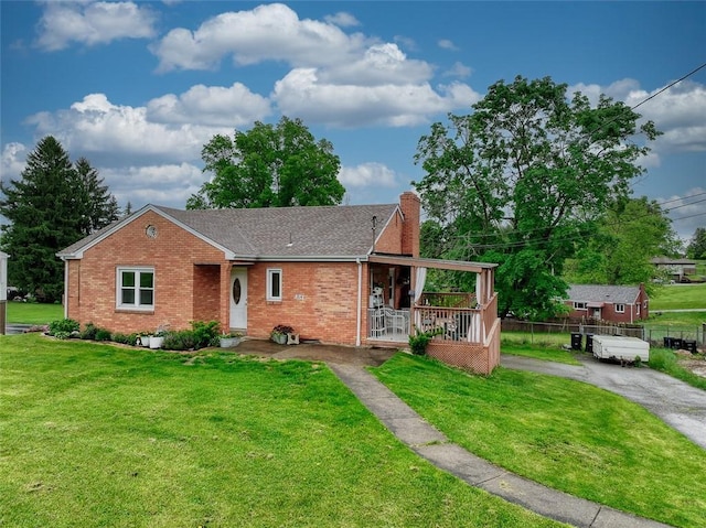 1814 Roosevelt Rd, Ohio Twp, PA 15143 - ranch-style home with a chimney, brick siding, and covered porch