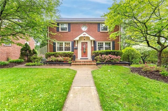 350 Tampa Ave, Mt Lebanon, PA 15228 - colonial-style house with a front lawn and brick siding