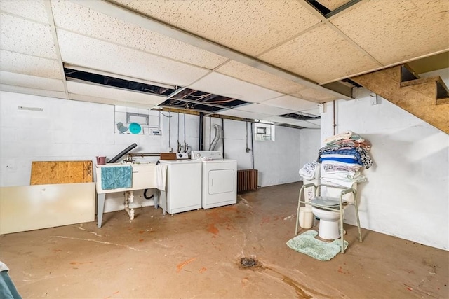 basement featuring washer and clothes dryer