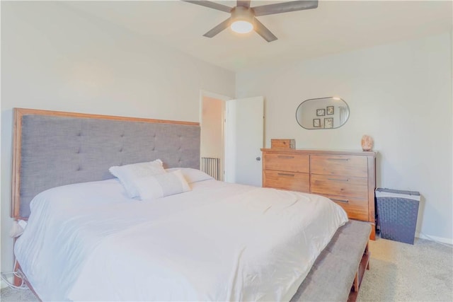 bedroom with carpet and a ceiling fan