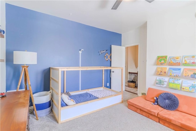 bedroom with carpet and a ceiling fan