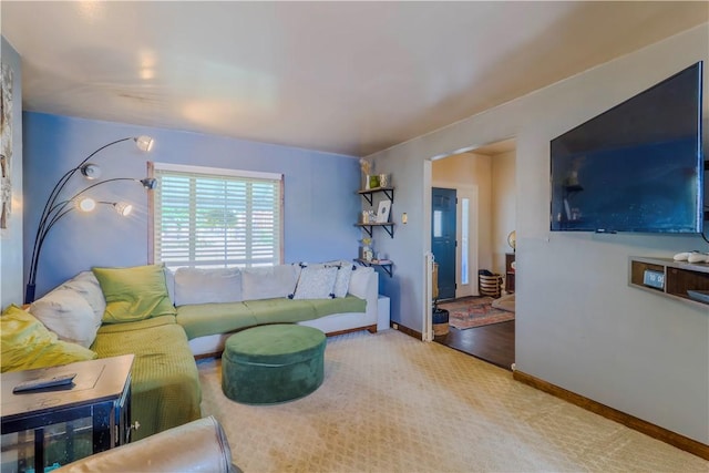 living room featuring baseboards