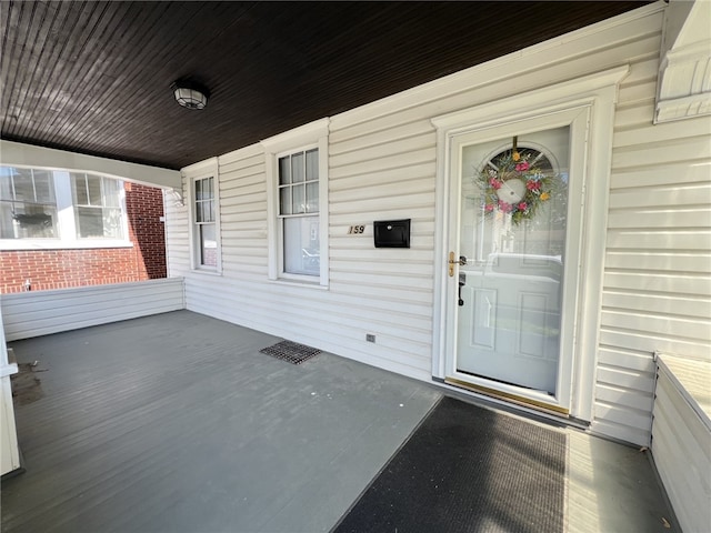 entrance to property with a porch