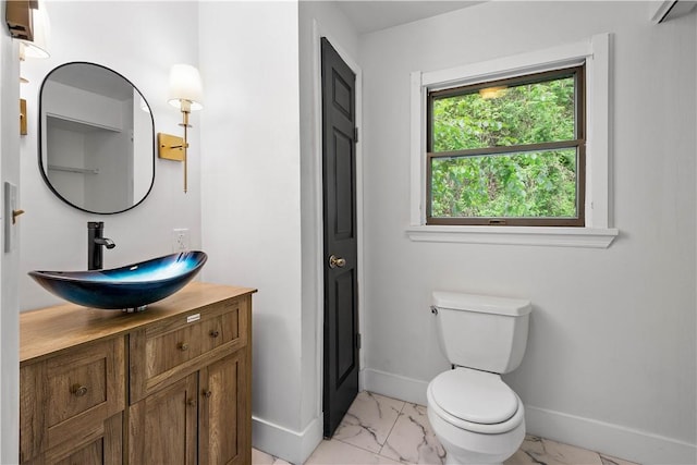 2710 Douglas Run Rd, Elizabeth Twp/Boro, PA 15037 - bathroom featuring baseboards, marble look tiles, toilet, and vanity