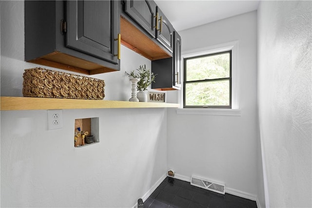 2710 Douglas Run Rd, Elizabeth Twp/Boro, PA 15037 - clothes washing area featuring dark tile patterned flooring, baseboards, hookup for an electric dryer, cabinet space, and hookup for a washing machine