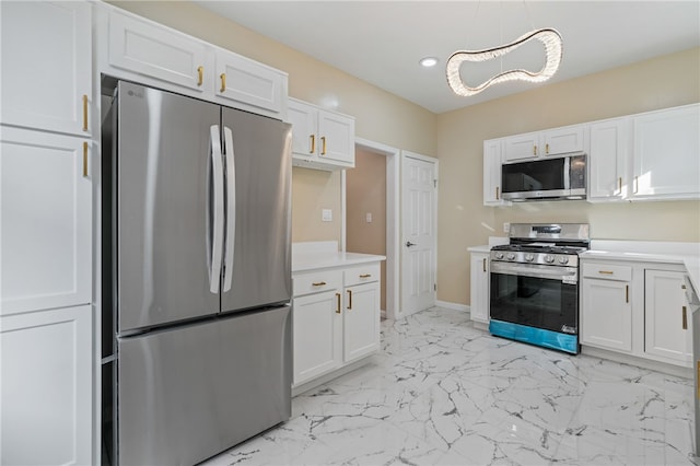 kitchen featuring stainless steel appliances, white cabinetry, recessed lighting, light countertops, and light marble finish floors