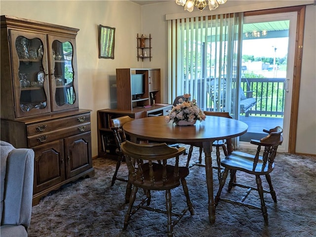 dining room with a chandelier