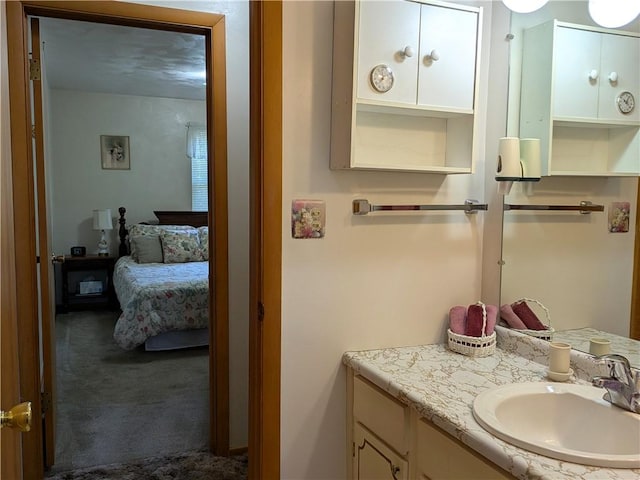 ensuite bathroom featuring vanity