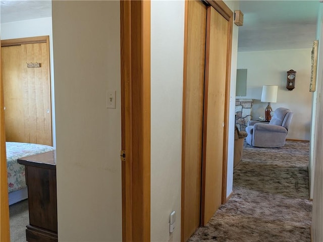 corridor with carpet flooring