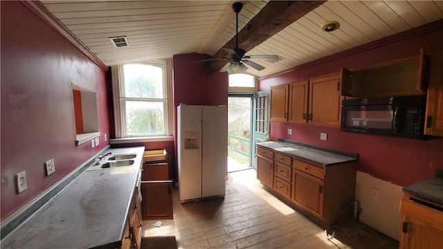 kitchen featuring white refrigerator with ice dispenser, black microwave, wood ceiling, brown cabinetry, and ceiling fan