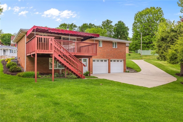 rear view of house featuring brick siding, a deck, driveway, and stairs