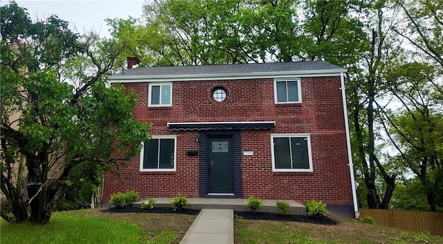 7709 Mark Dr, Penn Hills, PA 15147 - view of front of property with brick siding, a chimney, and fence