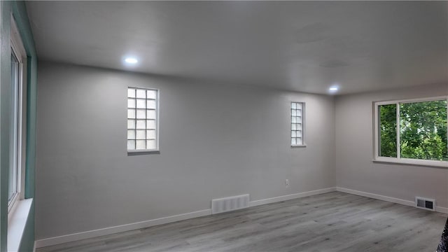 7709 Mark Dr, Penn Hills, PA 15147 - spare room featuring healthy amount of natural light, wood finished floors, baseboards, and recessed lighting