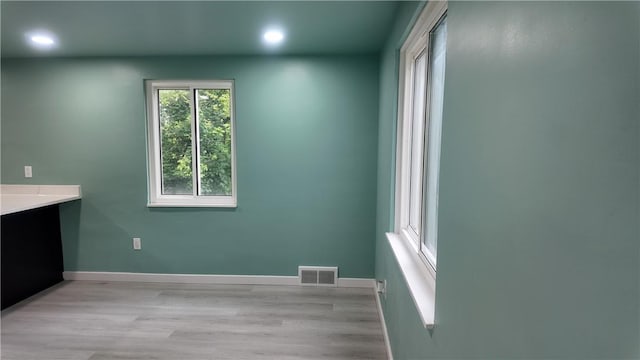 7709 Mark Dr, Penn Hills, PA 15147 - washroom with recessed lighting, light wood finished floors, and baseboards