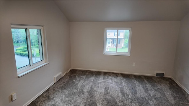 7709 Mark Dr, Penn Hills, PA 15147 - carpeted empty room featuring lofted ceiling and baseboards