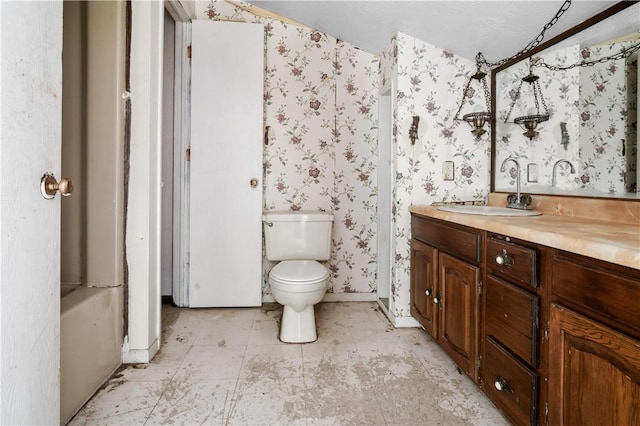 1035 Rte 130, City Of Greensburg, PA 15601 - full bathroom featuring toilet, wallpapered walls, vanity, and baseboards