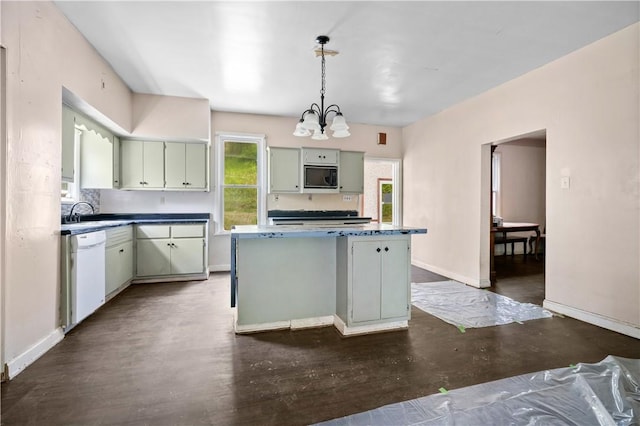 1035 Rte 130, City Of Greensburg, PA 15601 - kitchen featuring dishwasher, black microwave, a chandelier, a center island, and baseboards