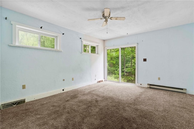1035 Rte 130, City Of Greensburg, PA 15601 - carpeted spare room featuring baseboard heating, ceiling fan, and baseboards