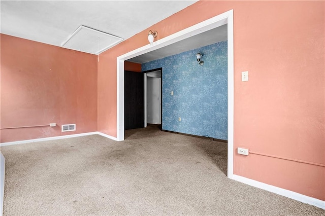 1035 Rte 130, City Of Greensburg, PA 15601 - carpeted empty room featuring attic access and baseboards