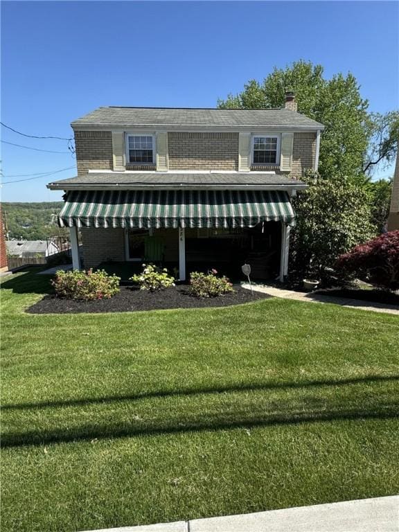 286 Brighton St, Chalfant Boro, PA 15112 - view of front of property featuring a front yard and a chimney