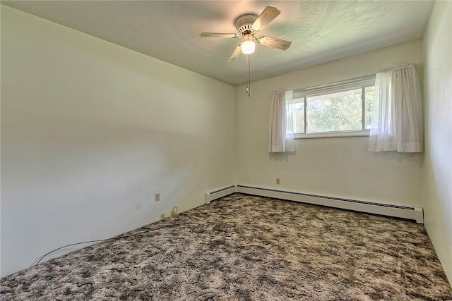 carpeted spare room with baseboard heating and a ceiling fan