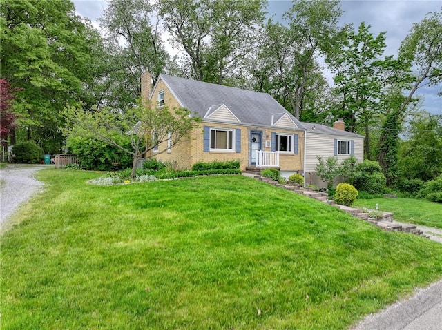 140 8th Ave, Ross Twp, PA 15229 - view of front of home featuring a chimney, a front yard, and brick siding