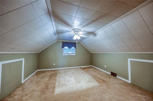 140 8th Ave, Ross Twp, PA 15229 - bonus room with carpet, a ceiling fan, vaulted ceiling, wooden walls, and baseboards