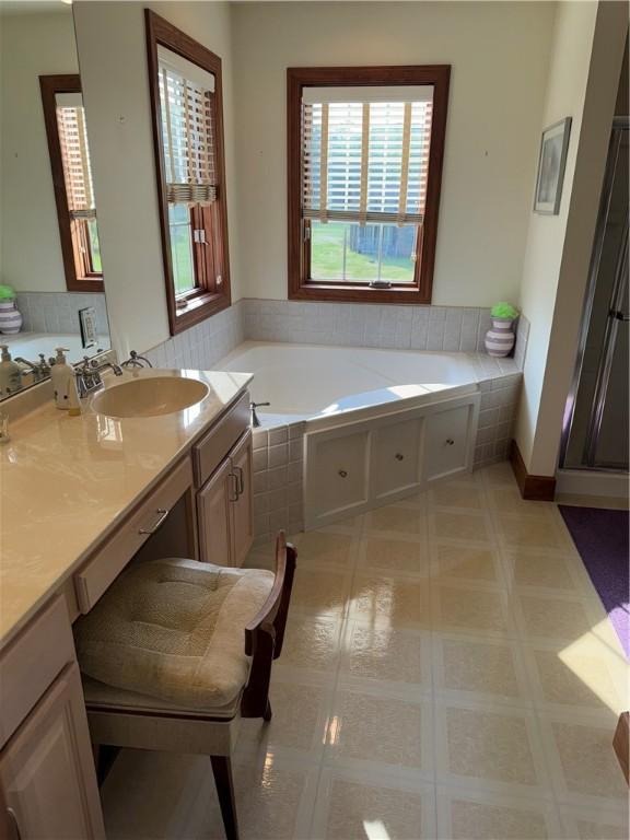 16 Finnin Rd, Allegheny Twp Wml, PA 15068 - full bathroom featuring a bath, vanity, and a shower stall