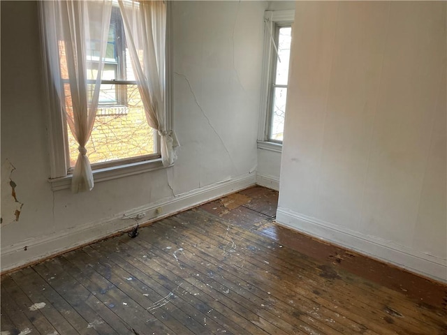 473 New 8th Ave, West Homestead, PA 15120 - empty room with hardwood / wood-style flooring, healthy amount of natural light, and baseboards