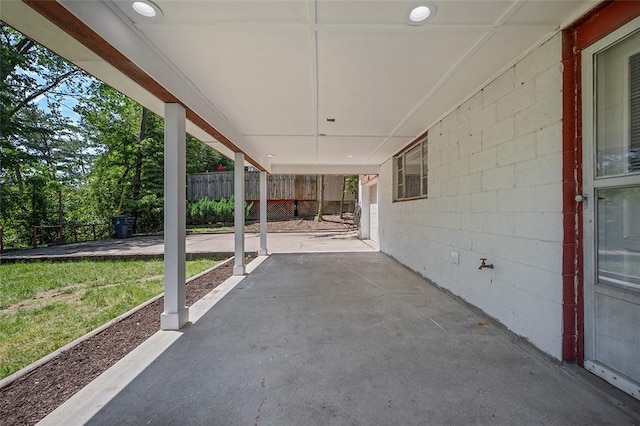 view of patio featuring fence