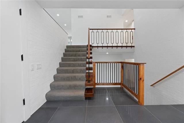 3413 Ridgewood Dr, Churchill Boro, PA 15235 - staircase with tile patterned floors and recessed lighting