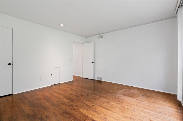3413 Ridgewood Dr, Churchill Boro, PA 15235 - unfurnished bedroom with wood finished floors, recessed lighting, and baseboards
