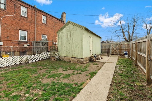816 E 11th Ave, Munhall, PA 15120 - fenced backyard with an outbuilding and a shed