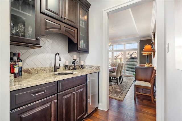 347 Buckingham Dr, Peters Twp, PA 15367 - kitchen with dark brown cabinets, a sink, dark wood-style flooring, decorative backsplash, and stainless steel fridge