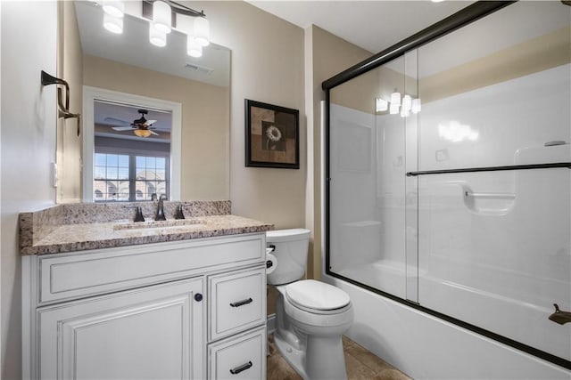 347 Buckingham Dr, Peters Twp, PA 15367 - bathroom featuring vanity, toilet, combined bath / shower with glass door, and ceiling fan