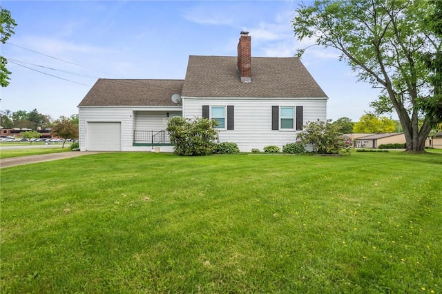 3601 Sharon Rd, West Middlesex Boro, PA 16159 - back of property with an attached garage, a chimney, a lawn, driveway, and roof with shingles