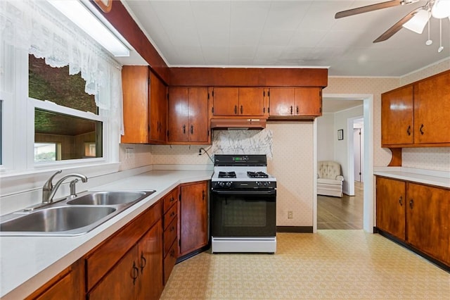3601 Sharon Rd, West Middlesex Boro, PA 16159 - kitchen with range with gas cooktop, a sink, custom range hood, light floors, and a ceiling fan