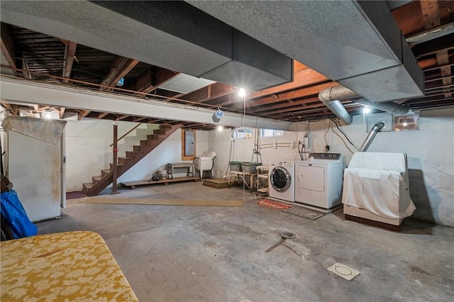 3601 Sharon Rd, West Middlesex Boro, PA 16159 - below grade area with washing machine and clothes dryer, stairway, and electric panel