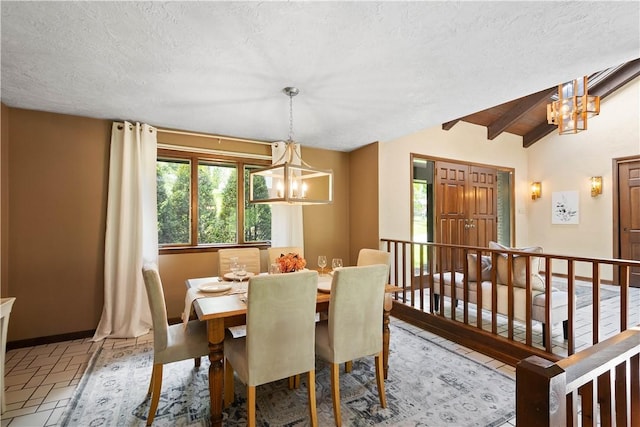114 Moore Dr, Peters Twp, PA 15317 - tiled dining area featuring a chandelier and a textured ceiling