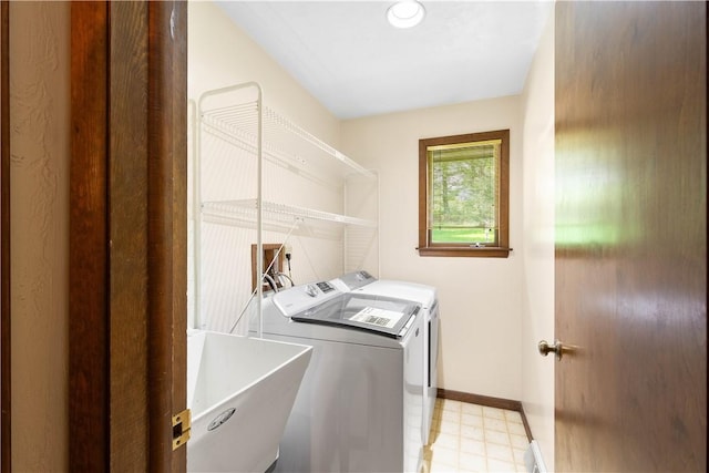 114 Moore Dr, Peters Twp, PA 15317 - washroom with separate washer and dryer, light flooring, and baseboards