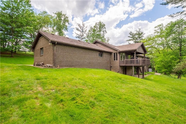 114 Moore Dr, Peters Twp, PA 15317 - rear view of house featuring a wooden deck, a yard, and brick siding