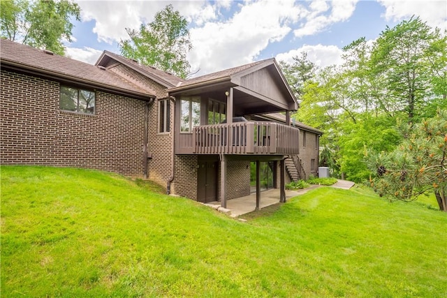 114 Moore Dr, Peters Twp, PA 15317 - rear view of property with a deck, stairway, a patio area, a yard, and brick siding