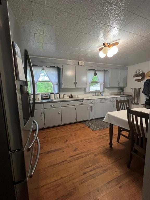 4536 State Route 158, Wilmington Twp, PA 16142 - kitchen with freestanding refrigerator, a sink, dark wood-type flooring, and healthy amount of natural light