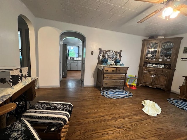 4536 State Route 158, Wilmington Twp, PA 16142 - dining room with arched walkways, a ceiling fan, wood finished floors, and baseboards