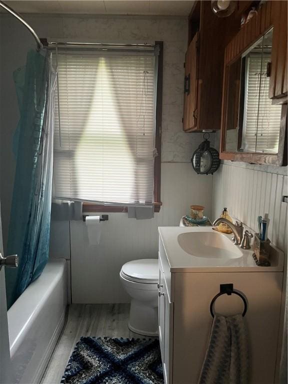 4536 State Route 158, Wilmington Twp, PA 16142 - bathroom featuring wood finished floors, toilet, vanity, and shower / bathtub combination with curtain