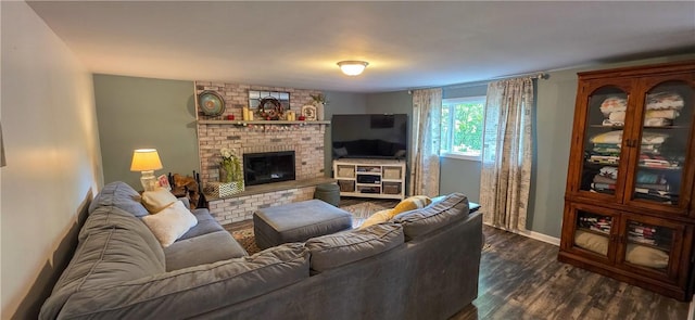 532 Strope Rd, Pa, PA 15021 - living area featuring a fireplace, dark wood-style flooring, and baseboards