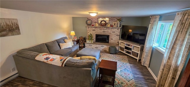 532 Strope Rd, Pa, PA 15021 - living area featuring a fireplace, baseboard heating, dark wood finished floors, and baseboards